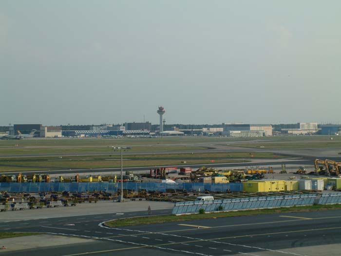 View over the maneuvering area of Rhein-Main airport. In the distance you can see Cargo City South and the new tower.