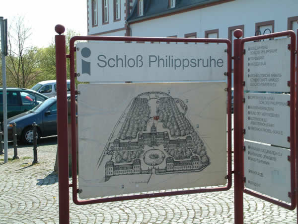 Information sign with an overview of Philippsruhe Palace Gardens