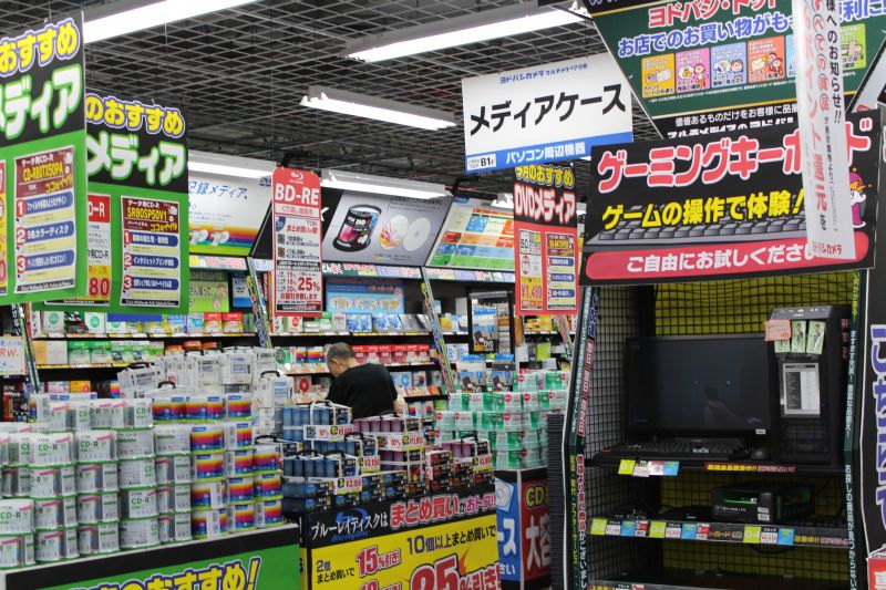 Overkill of colors and media in a japanese electronics superstore