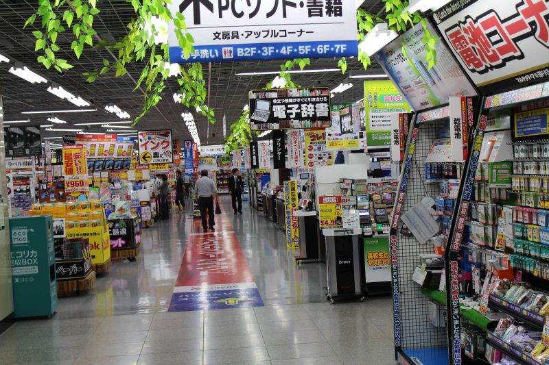 Overkill of colors and media in a japanese electronics superstore