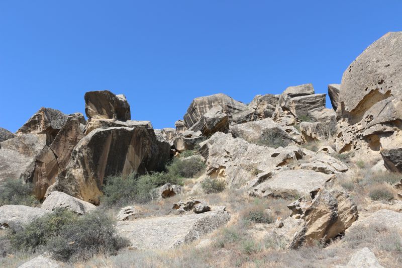 Large rocks in the Gobustan National Park. Many of them are covered with rock art engravings.