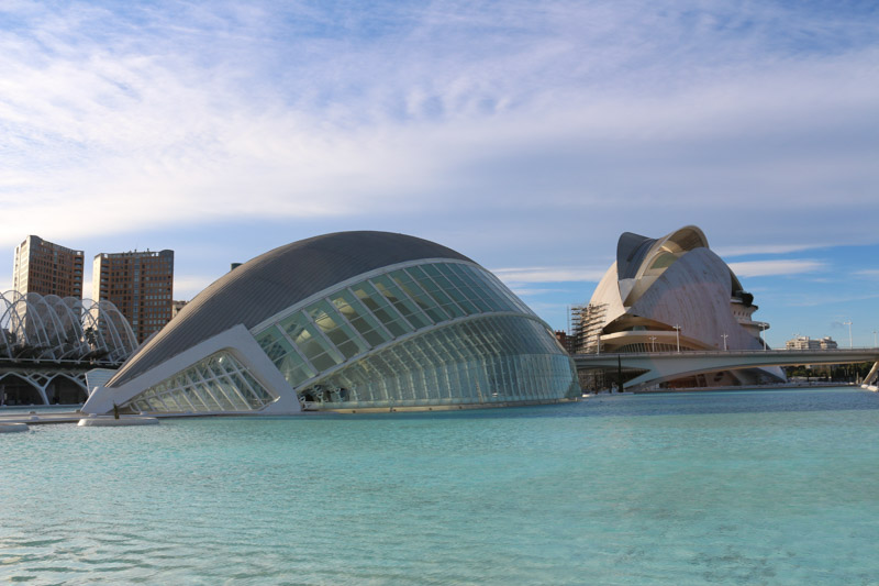 L'Hemisfèric and& Palau de les Arts Reina Sofia. The IMAX theater is surrounded by water.