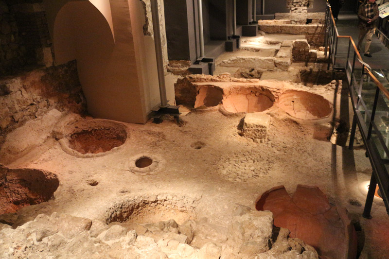 Remains of a Roman winery& shown in the& vault below& the Royal Palace of Barcelona