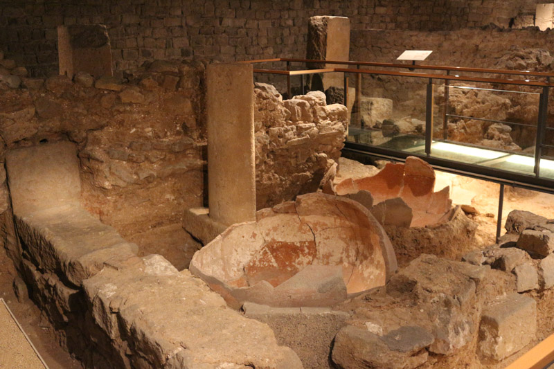 Remains of a Roman Saltfish and& Garum factory& shown in the& vault below& the Royal Palace of Barcelona