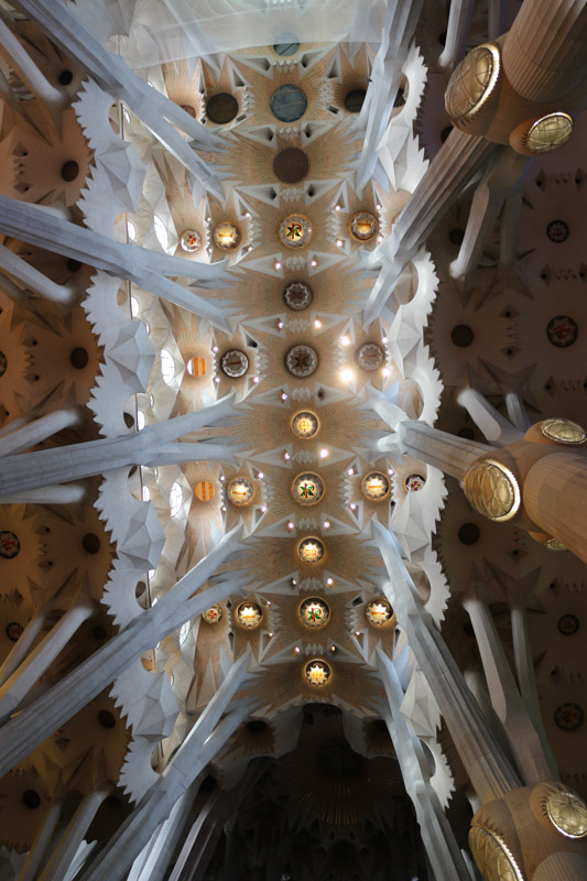 The central nave vaults reach forty-five metres (150& ft).& The columns of the interior are a unique Gaudí design. Besides branching to support their load, their ever-changing surfaces are the result of the intersection of various geometric forms. The simplest example is that of a square base evolving into an octagon as the column rises, then a sixteen-sided form, and eventually to a circle. This effect is the result of a three-dimensional intersection of helicoidal columns (for example a square cross-section column twisting clockwise and a similar one twisting counter-clockwise).