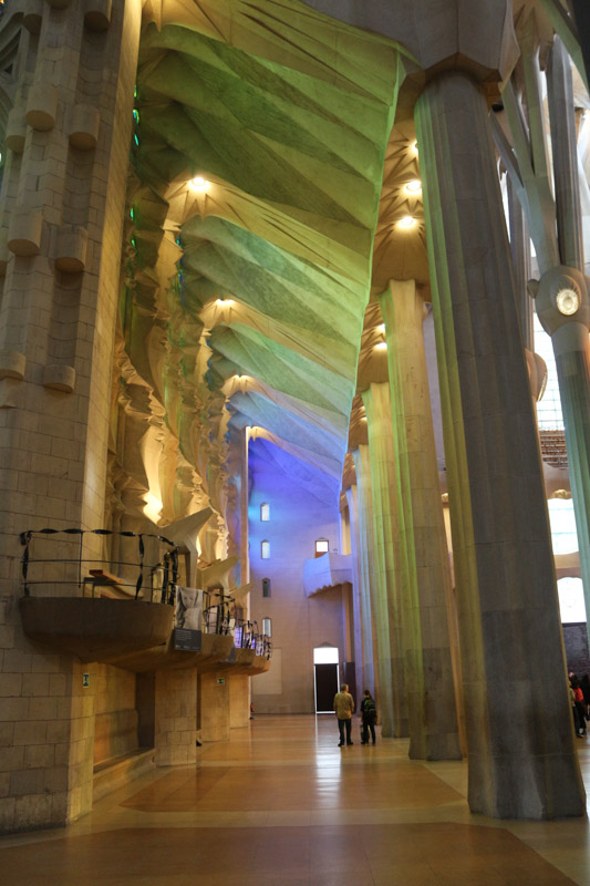 Light coming through& the colorful windows of the basilica