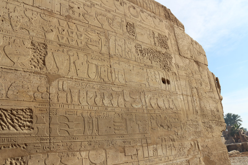 This wall is basically a gigantic donation receipt. It list all goods and treasures donated by the pharaoh to the temple of Karnak