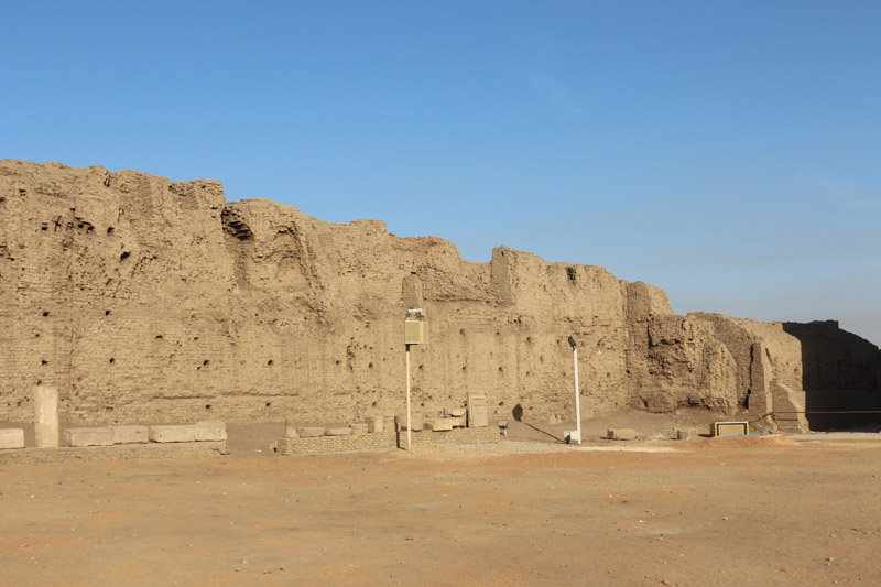 An enormous wall of Nile mud bricks surrounds the temple