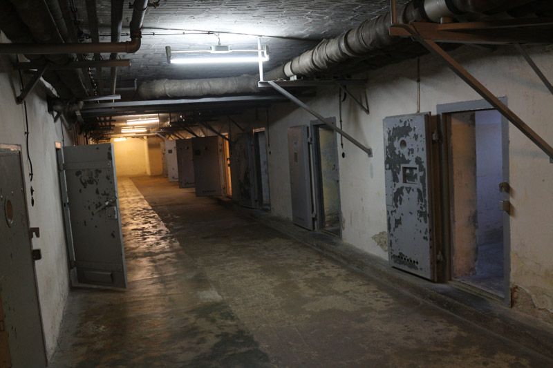 Corridor in the old prison block which was built by the Red Army in the basement of the old building