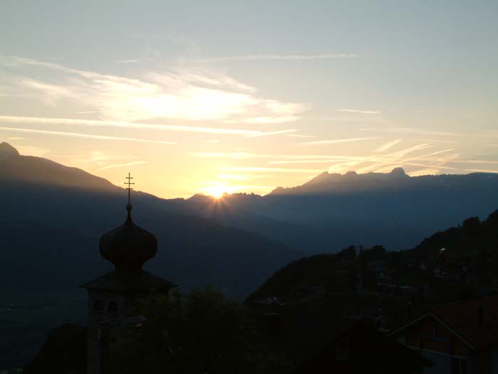 View from the village of Triesenberg over the Rhine Valley and the Swiss Alps