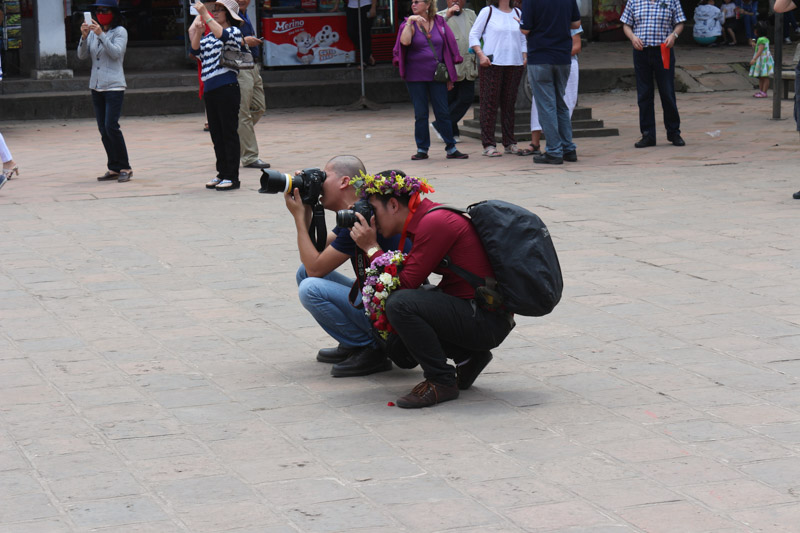 Class of students posing for a photo in the Temple of Literature