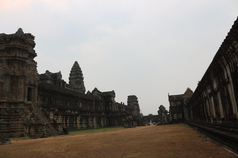 The dawn& visit to Angkor Wat mostly failed because the sun was hidden behind clouds and mist.