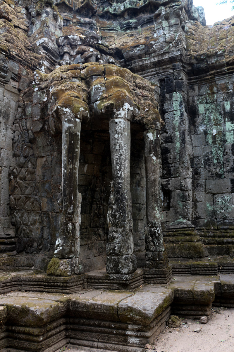 Stone elephant's trunks supporting the northern Angkor Thom gate
