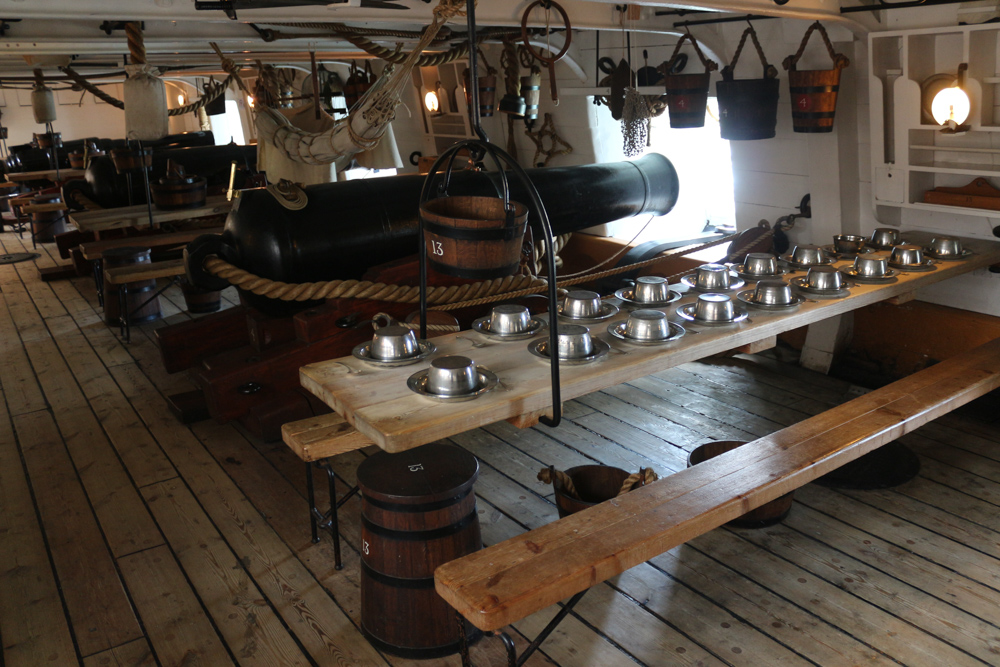 Crew silverware on the gundeck of HMS Warrior