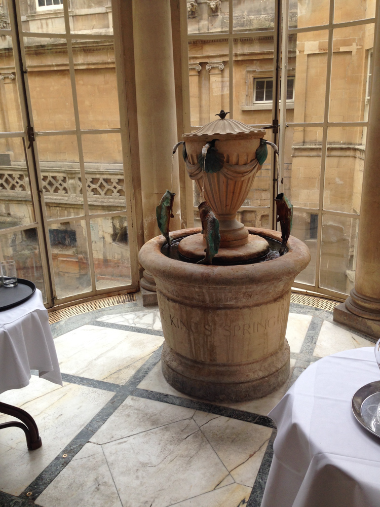 Look into the Georgian Pump Room above the ancient hot spring. The water is presented in the so called King's Spring.