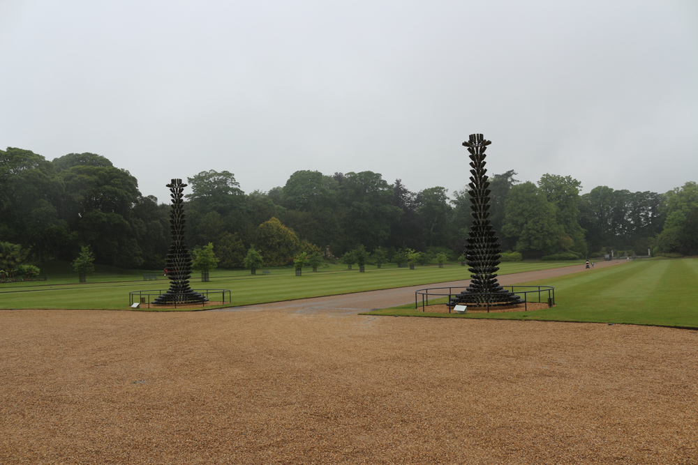 Bottles of of Chateau Mouton Rothschild flank the path up to Waddesdon Manor House