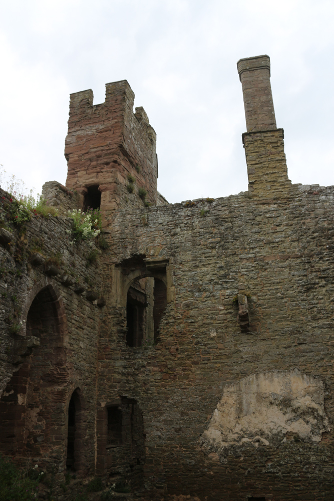 Chimneys above the ruined walls of the castle palace