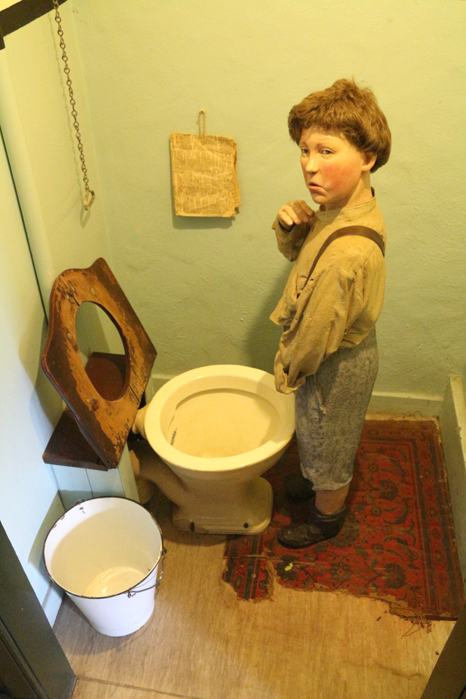 Toilet in the example workers apartment in the living quarters of the New Lanark factory