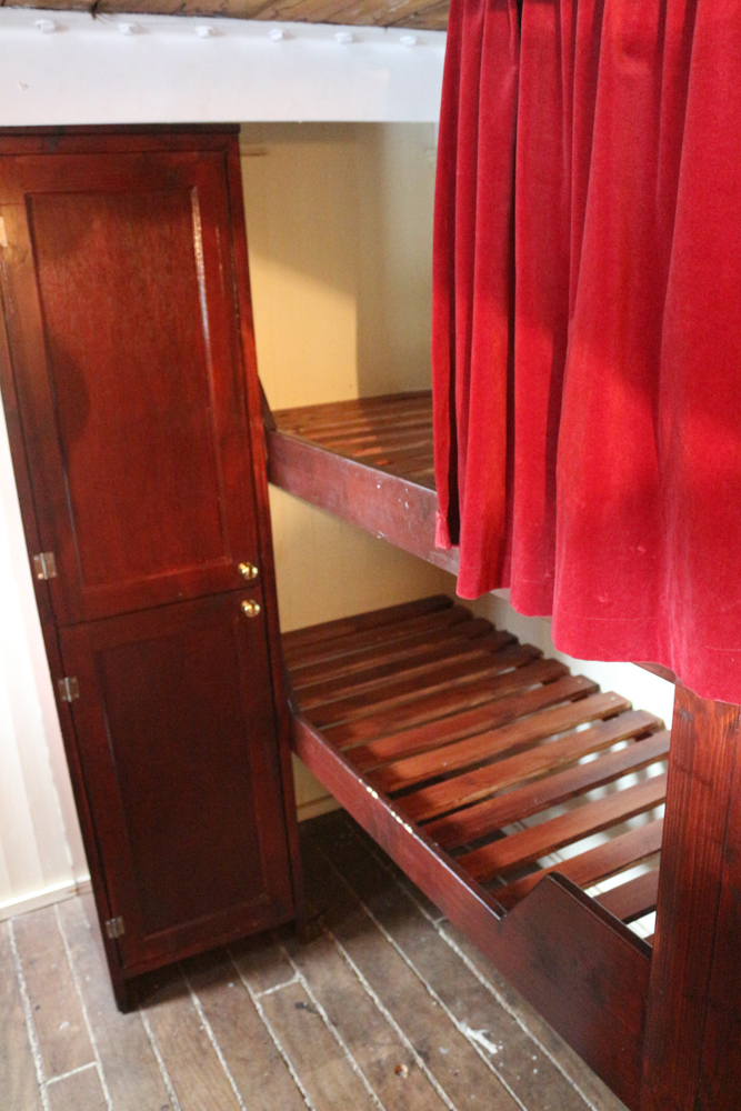 Officers cabin inside the Tall Ship alongside the Riverside Museum