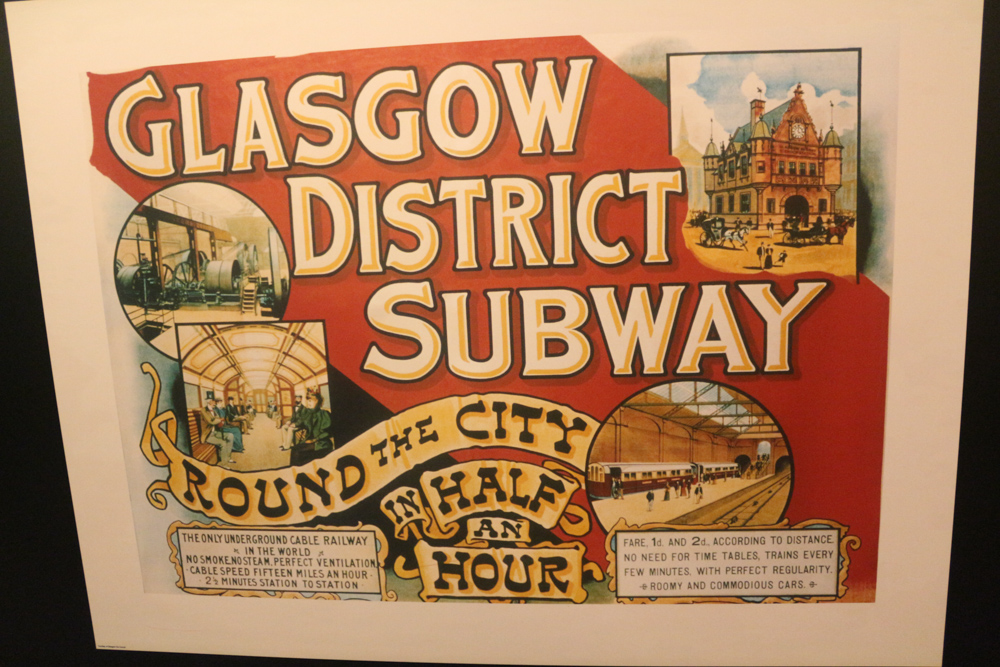 Old advertisement of the Glasgow District Subway. The cart was pulled by a wire.