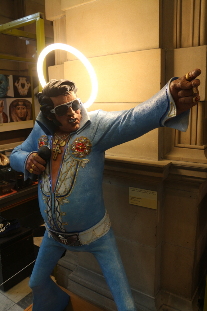 Elvis, the King, statue with electric halo in the Kelvingrove Museum