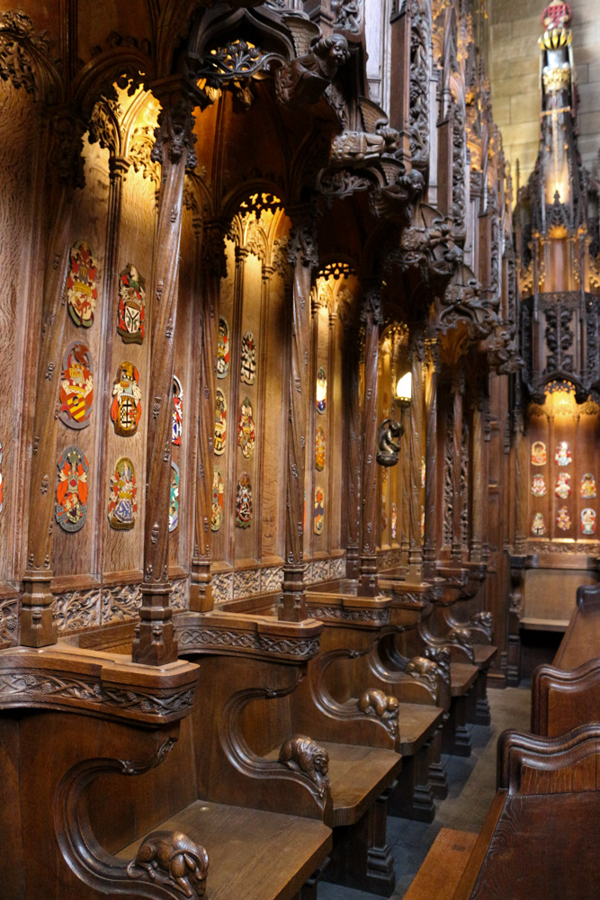 Thistle Chapel in St Giles' Cathedral. The knights of The Most Ancient and Most Noble Order of the Thistle decorate their seats with individual coat of arms.