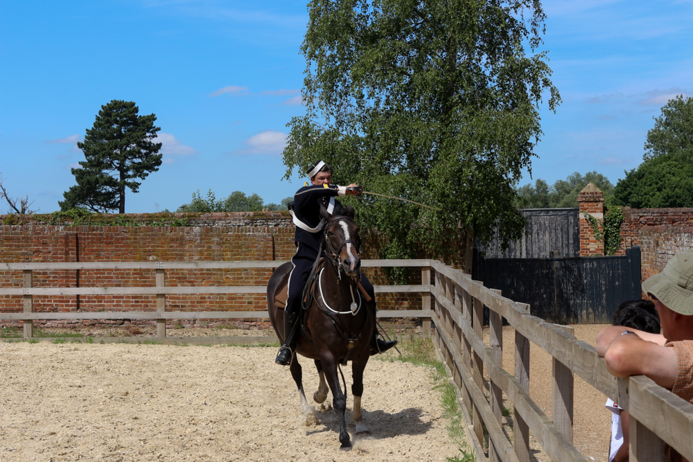 English dragoons practicing on the grounds of Audley End House