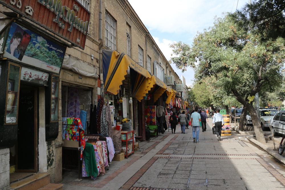 Shops next to a main street of Shiraz