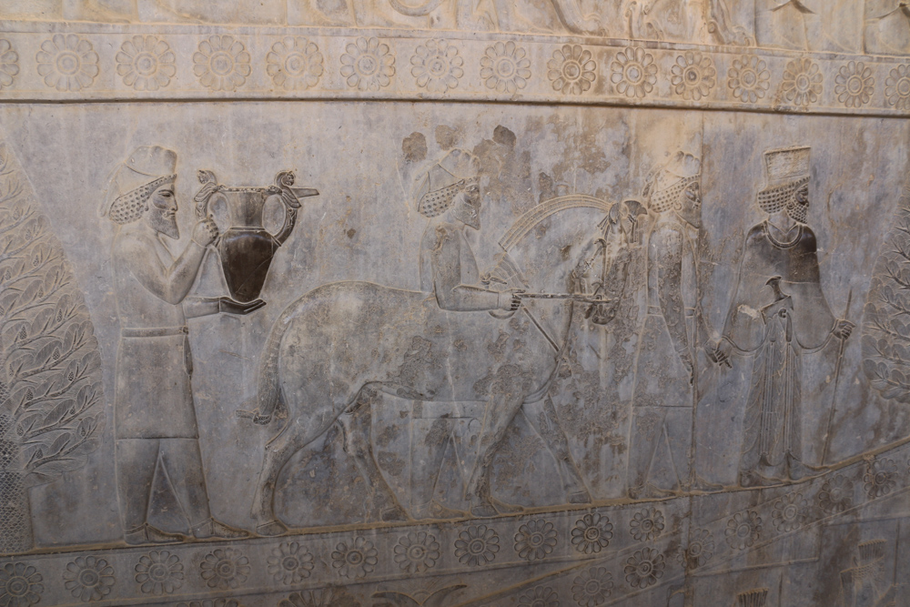 Details of the bas-relief at the eastern staircase of the large Apadana palace: Armenian delegation with metal jar and a horse.