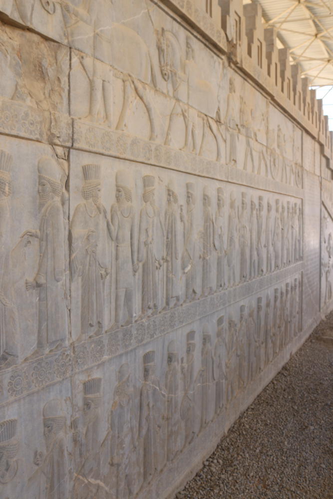 Bas-relief at the eastern staircase of the large Apadana palace showing messengers from all parts of the Persion Empire in their local traditional clothing bringing presents from their home country to the king in Persepolis.