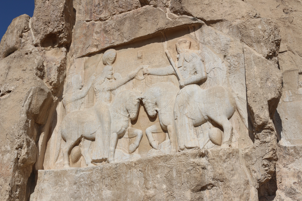 Naqsh-e Rustam: Relief with the investiture of Ardashir I where the founder of the Sassanid Empire is seen being handed the ring of kingship by Ahura Mazda.