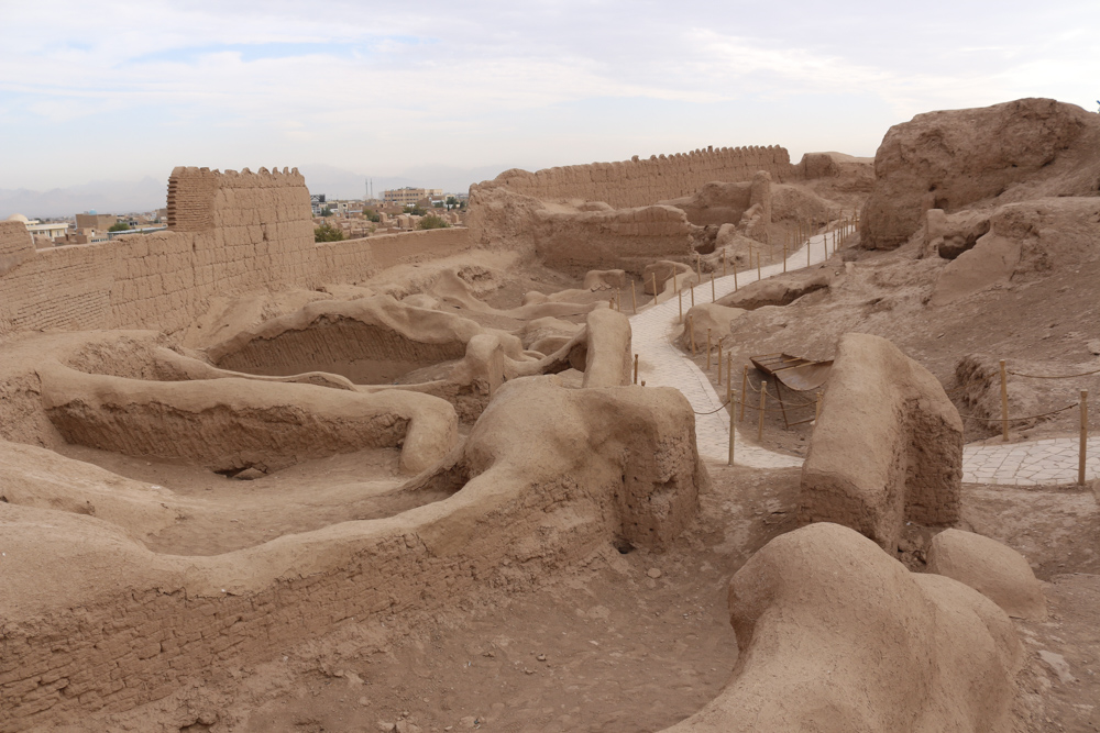 The mud-brick walls give Narin Qal'eh an almost amorphous look