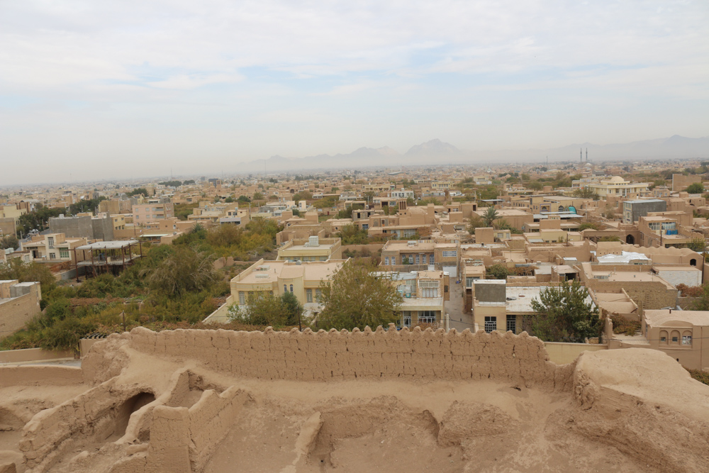 View from castle over the mud-brick desert city of Meybod and the surrounding mountain range