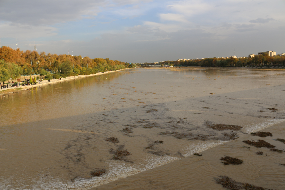 One of the rare moments when water is flowing through the river Zayandeh