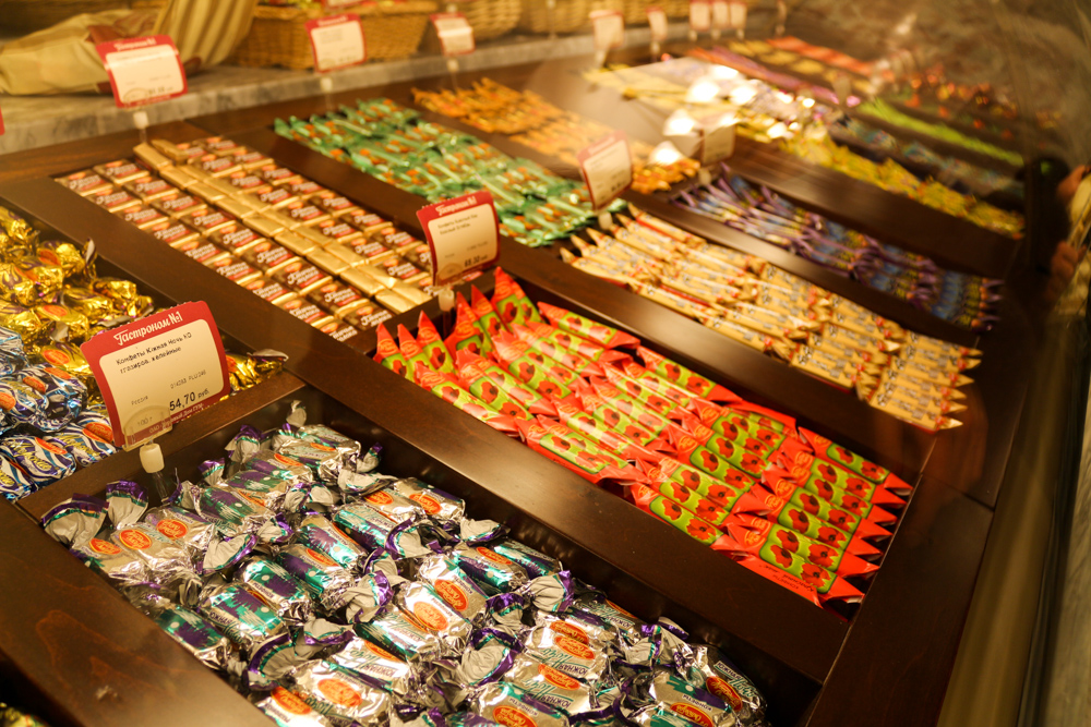 Various types of chocolate on display in a grocery shop of the GUM shopping mall