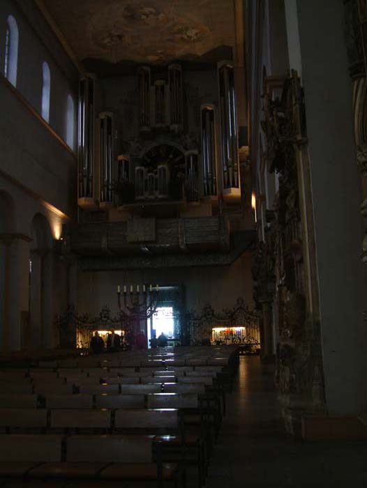 The St. Kilian cathedral was heavily damaged during the bombardment of Würzburg on March 16, 1945. 90 percent of the city was laid to ruins by a British bombing campaign. Unfortunately the nave was designed in a modern 50s style and only parts of the former baroque interior were restored during the reconstruction.