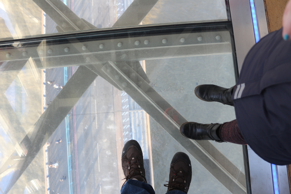 Glass floor in the visitor area of the upper deck of the Tower Bridge