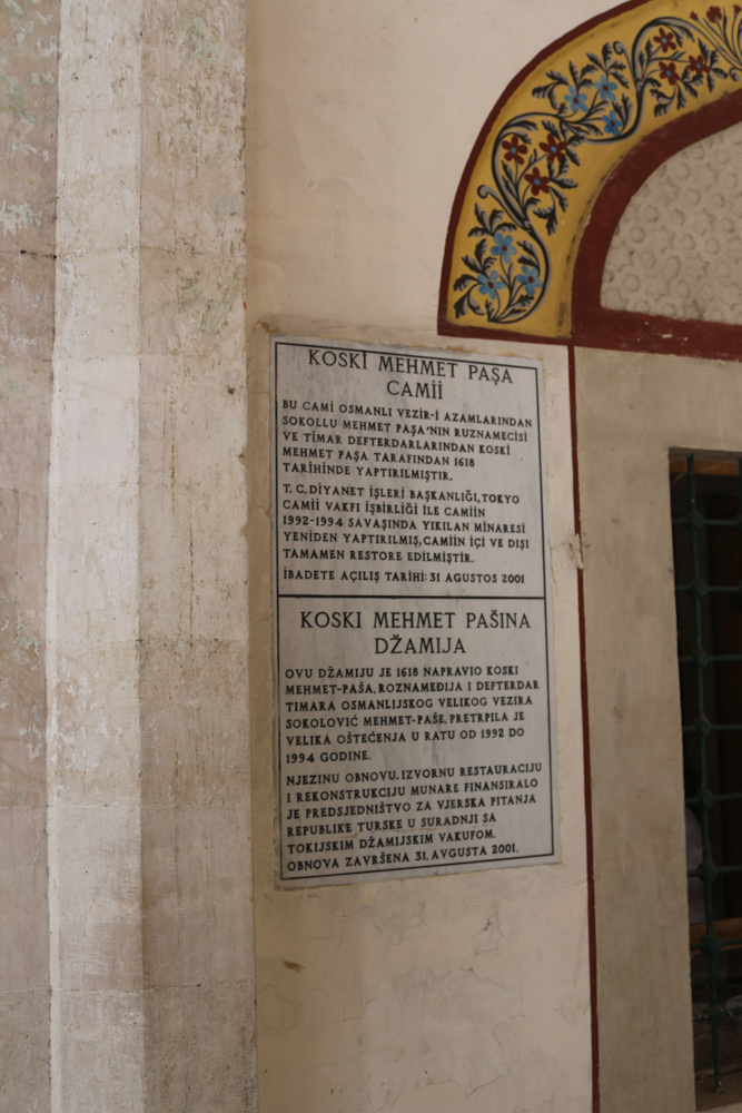 Sign at the entrance of the Koski Mehmed Pasha Mosque or Karađoz Bey Mosque in Mostar