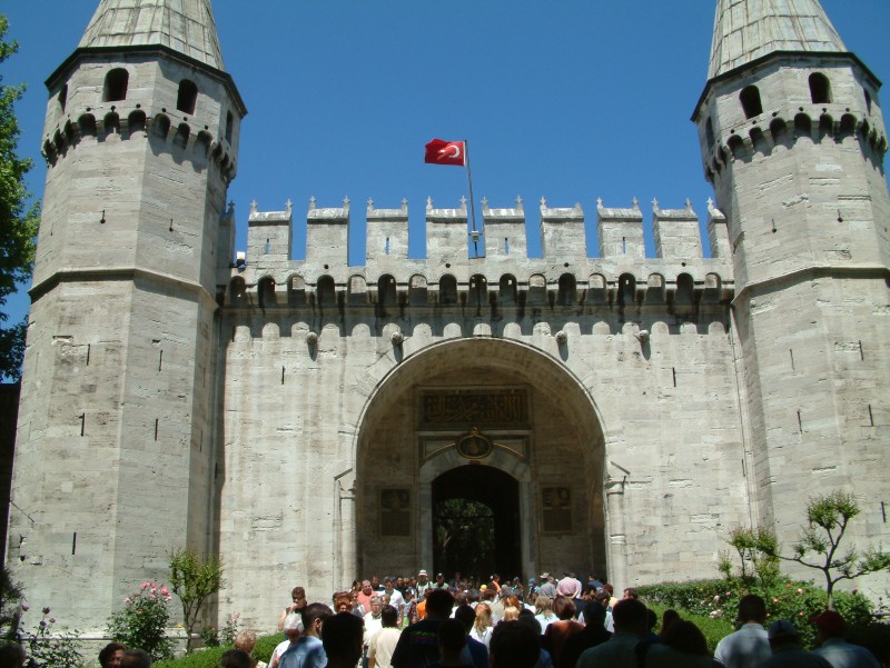 Topkapı Palace (Topkapı Sarayı in Turkish, literally the "Cannongate Palace"), located in Istanbul (Constantinople), was the administrative center of the Ottoman Empire from 1465 to 1853. The construction of the Topkapi Palace was ordered by Sultan Mehmed II in 1459. It was completed in 1465. The palace is located on the Seraglio Point between the Golden Horn and the Sea of Marmara in Istanbul, having a splendid view of the Bosphorus. It consists of many smaller buildings built together and surrounded by four courts.