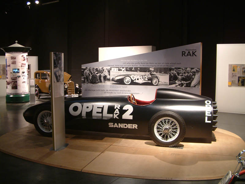 Modell of the Opel Rocket Car RAK 2 from 1928. This five meter rocket with wheels can be seen during the tour of the Opel car manufacturing plant in Rüsselsheim (nearby Frankfurt).

Fritz von Opel tried to break the speed record with this car on May 23rd, 1928 on the AVUS in Berlin. 24 solid rockets with 120 kilograms of explosives boosted him to 230 kilometres per hours. This was not enough for the world record but definitely not a very comfortable ride.