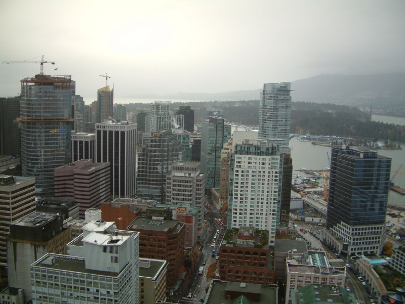 View from "Vancouver Lookout!" on top of the Harbour Centre Tower. Behind the high-rise buildings you can see Stanley Park.