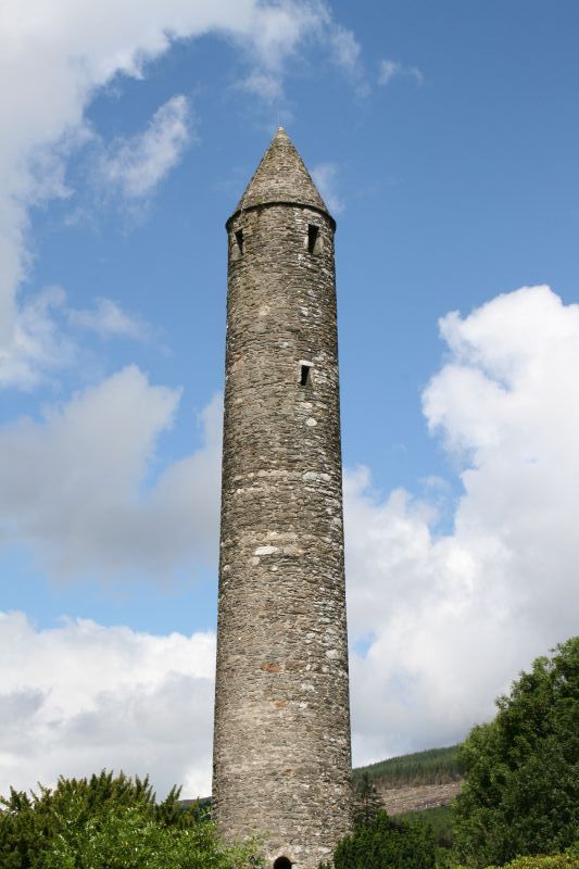 The round tower was built during the era of the viking invasions in Ireland (up to and around 1066), in order to protect the religious books and chalices used around the monastery at the time.