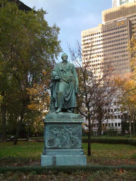 The historic Goethe statue in from of the Commerzbank skyscrapers