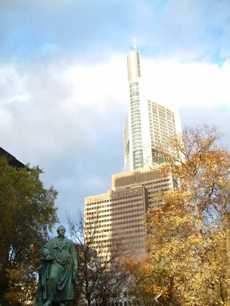 Goethe statue surrounded by skyscrapers