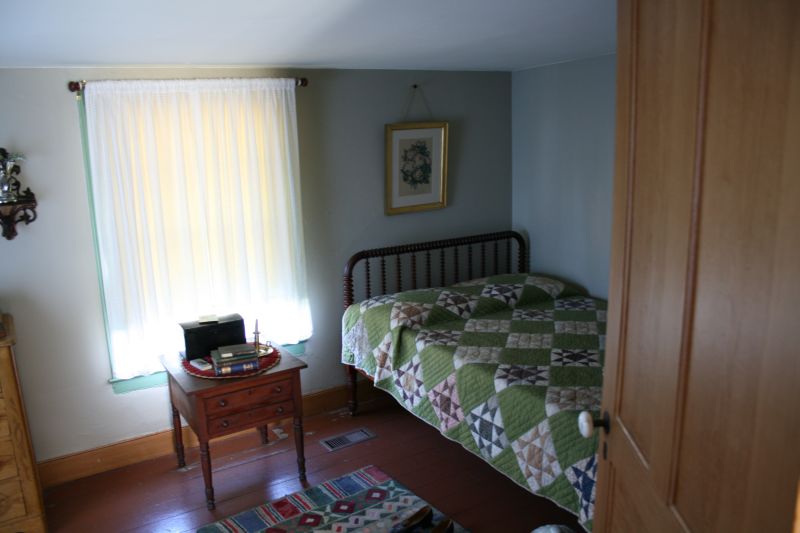 Bed room of one of the historic hourses in Greenfield Village