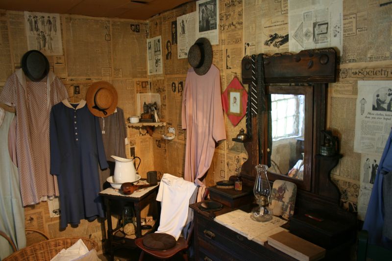Bedroom room in the Mattox familiy home. This is an example for living conditions of poor families during the Great Depression. The walls were covered with old newspapers to improve insulation.