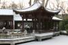 Chinese garden in Frankfurt's Bethmannpark covered with snow