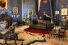 Highly unusual dark blue colors in the bedroom of the Queen of Portugal. Looks like a scene from the movie "Fifth Element" where Korben Dallas sits on a bed on board the Fhloston Paradise cruise ship while phoning his mom. This includes the big animal skin on the floor.