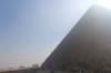 The Great Pyramid of Giza (also known as the Pyramid of Khufu or the Pyramid of Cheops) is the oldest and largest of the three pyramids in the Giza Necropolis bordering what is now El Giza, Egypt. It is the oldest of the Seven Wonders of the Ancient World, and the only one to remain largely intact.