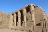 Etwa 60 Meter südwestlich des Hauptportals steht vor dem Pylon des Tempels von Edfu ein kleines, mit Säulen flankiertes Gebäude. Das eingeschossige Bauwerk war ein Heiligtum der Göttin Hathor von Dendara.

Das in ptolemäischer Zeit als Hut-Chenmet („Haus der Amme“) bezeichnete Gebäude war ein so genanntes „Geburtshaus“, ein Mammisi (aus dem Koptischen, „Ort der Geburt“ bedeutend). Im Mammisi von Edfu wurde neben Hathor der Kindgott Hor-Semataui-pa-chered („Harsomtus, das Kind“) als Erbe des Hauptgottes von Edfu Hor-Behdeti verehrt. Hier erneuerte sich jährlich das Wunder der Geburt des Hor-pa-chered, weshalb dies auch ein heiliger Ort für schwangere Frauen war.